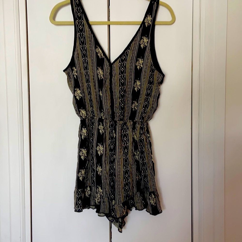 Romper in size medium .. beach or night out